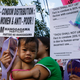 Protesters march in response to the escalating numbers of Filipinos infected with HIV during a protest in front of the Catholic Bishops Conference of the Philippines in Manila March 8, 2010.